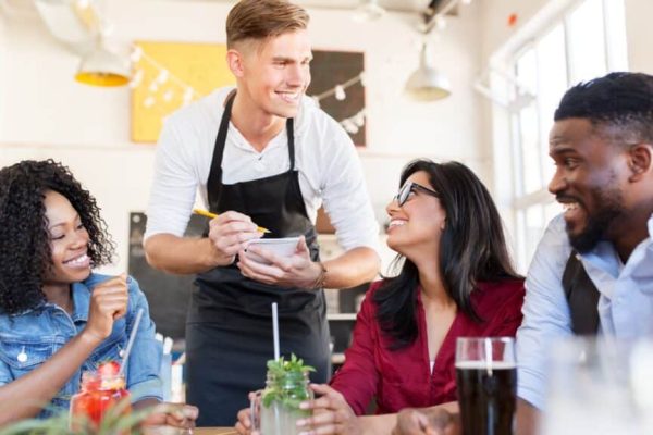 Restaurant staff supporting daily dining operations